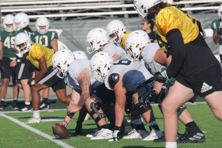 The Sacramento State Hornets offensive line prepares for the snap in practice Wednesday Sept. 14, 2022 at the Hornet practice field. The Hornets allowed just one sack in their 56-33 Week 1 victory over Utah Tech.