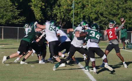Redshirt freshman quarterback Dorian Hale fires up a deep throw as the starting defense rushes after him during practice on Tuesday, Sept. 27, 2022. Sac State is seeking their first 4-0 start for the second time in program history.