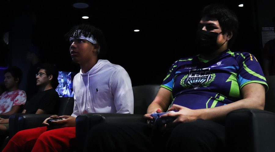 Joshua Livingston (left) playing a tournament match of Smash Brothers Ultimate against Jorge Costilla (right) at the games room on Friday Sept. 16, 2022. Few players were remaining as the competition was winding down.
