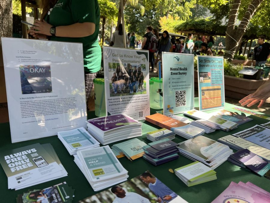 A table of mental health resources set up in the Library Quad on Oct. 10, 2022. According to the organizer of the event, Lara Falkenstein, many students are unaware of the mental health resources Sac State has to offer.