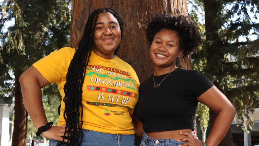 (Left to Right) Shay Spencer and Leila Cormier standing outside of The Hornet Bookstore on Thursday, Oct. 20, 2022. “It’s a paid holiday in a sense we are getting the reparations that we haven’t received in the past,” Spencer said.