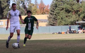 LEAD: Junior midfielder Cody Sundquist runs back on defense trying to recover the ball from University of California, Davis’ junior defender Sean Bilter at Hornet Field on Saturday, Oct. 29, 2022. The Hornets fell to the Aggies 2-1 at home. 