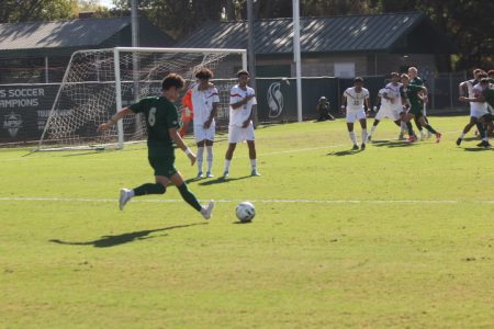 Sac State junior midfielder Cody Sunquist takes a freekick outside the box versus CSU Northridge at Hornet Field in Sacramento on Oct. 5, 2022. Suquist has scored two goals this season, one of them gave the Hornets a win in Bakersfield. 
