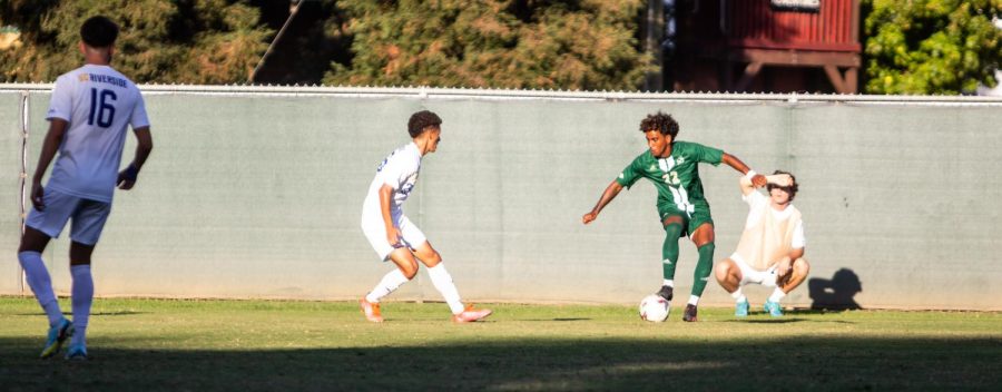 Freshman defender Justin Faison takes on UC Riverside junior forward Armando Ibarra at Hornet Field on Wednesday, Oct. 15, 2022. The Hornets hosted the University of California, Riverside, Saturday afternoon. The Hornets came back to win the game 2-1 after the Highlanders took an early lead. 