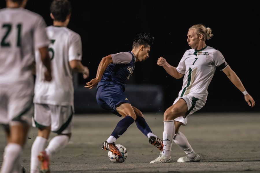 Sac State junior forward Austin Wehner battling for possession against UC Irvine Saturday, Oct. 7, 2022, at Bren Events Center. The Sacramento State Hornets found themselves on the road suffering a 1-0 loss to the Anteaters. 