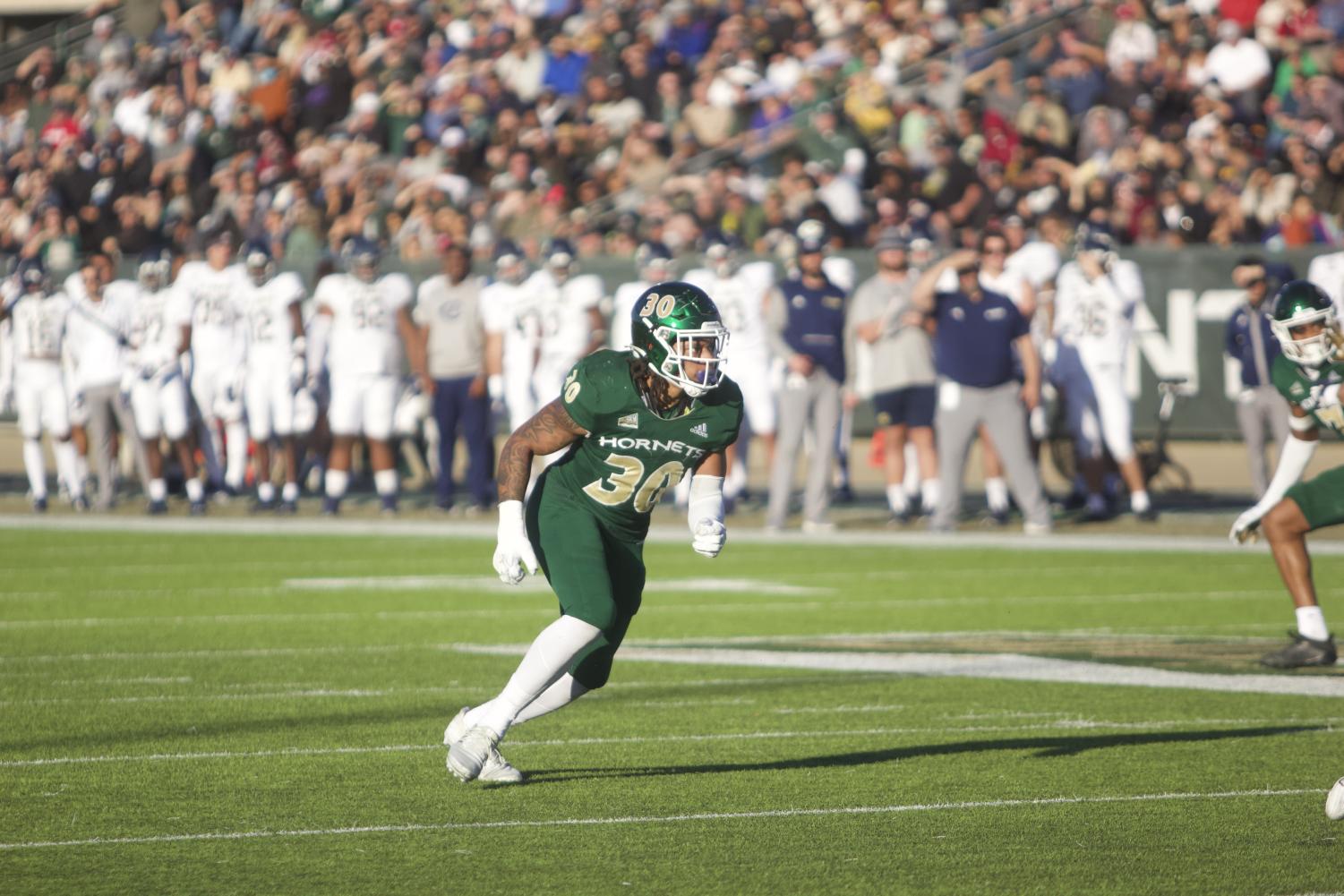 Senior linebacker Armon Bailey running across the field gainst UC Davis Saturday, Nov.19, 2022, at Hornet Field in the 68th annual causeway classic. The Hornets also clinched home-field advantage throughout the 2202 FCS playoffs with the defeat of the Aggies.
