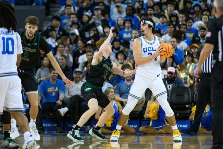 [FILE]: Junior guard Austin Patterson guarding UCLA senior guard Jaime Jaiquez Jr. against UCLA Monday, Nov. 8, 2022, at Pauley Pavilion in Los Angeles, California. The Hornets snuck out of Magness Arena in Denver, Colorado with a 73-69 win over the Denver Pioneers Monday night.