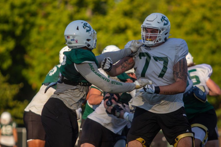 Sac State freshman offensive lineman Tyler Perez battles with a fellow Hornet during offensive walk-throughs in Sacramento on Wednesday, Oct. 12, 2022. With a physical game in store for both teams, Sac State has to win in the trenches to have a chance against Weber State.