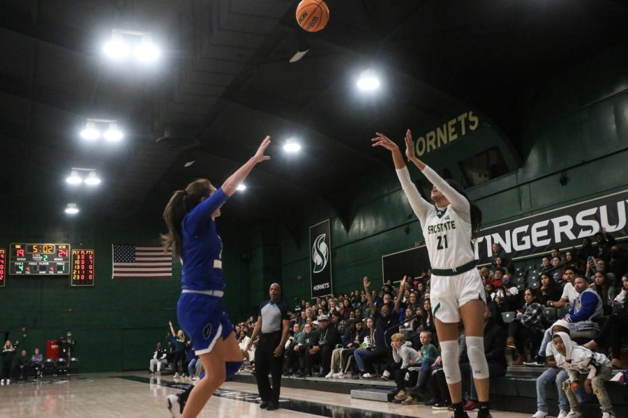 Senior forward Kaylin Randhawa shooting a corner three point shot at The Nest in a 70-68 overtime win for Sacramento State over UC Santa Barbara Saturday, Nov. 19, 2022. The Hornets improved to 2-1 on the year with the win over the Gauchos.