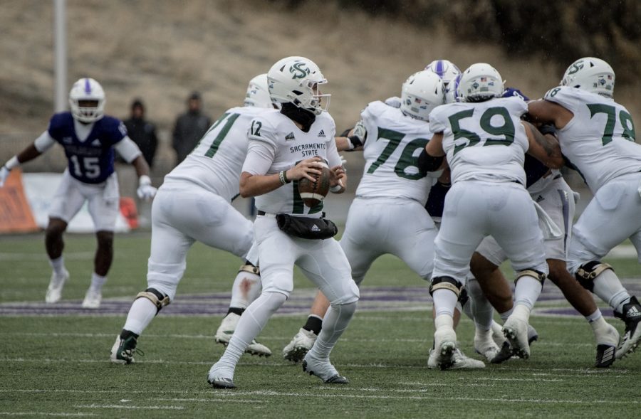 Sac State senior quarterback Jake Dunniway drops back and looks for an open receiver against Weber State on Saturday, Nov. 5, 2022 at Stewart Stadium. Dunniway rebounded against the Wildcats with no turnovers, a feat he looks to continue against Portland State.

