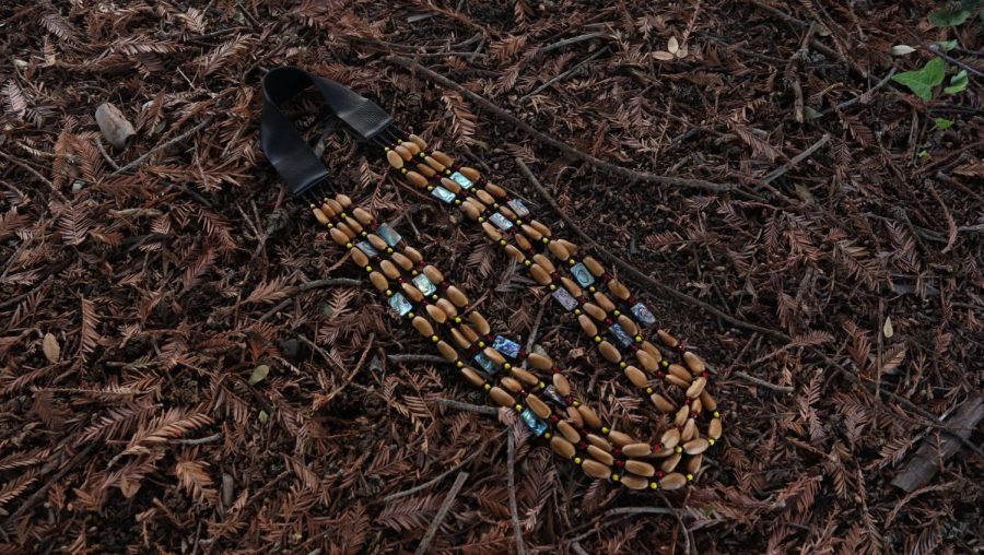 A necklace created by ethnic studies professor Anthony Burris near Amador Hall  Oct. 19. Burris primarily uses materials found in traditional Miwok art such as shells and beads. 