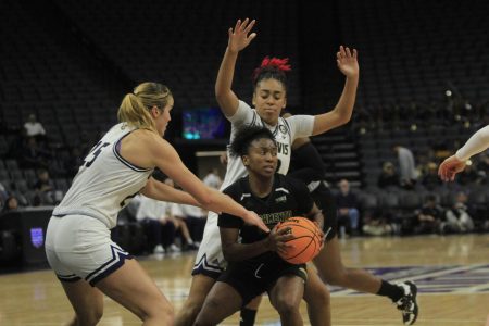 (FILE)Senior guard Kahlaijah Dean looks to evade UC Davis defenders in a 67-45 victory for Sac State on Nov. 22, 2022 at Golden 1 Center in Sacramento,CA. The Hornets are enjoying their first 5-1 start since the 2013-2014 season.
