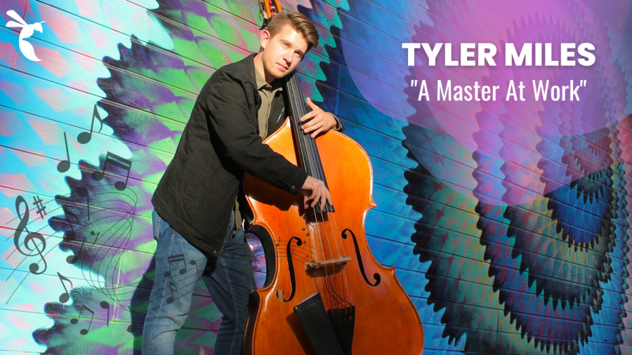 Tyler+Miles+strums+his+bass+in+front+of+a+mural+near+Capistrano+Hall+Thursday%2C+Nov.+10%2C+2022.+Miles+is+a+seasoned+musician+and+a+graduate+of+Sac+State%E2%80%99s+School+of+Music.+