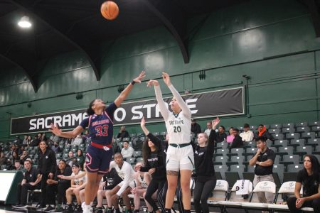 Sophomore guard Katie Peneueta shoots a three against Fresno State Dec. 3, 2022, at The Nest in a narrow 62-61 Hornet win. After dropping their season opener, Sac State has now won six in a row. 