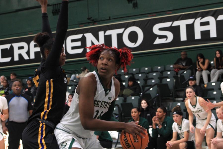 Junior center Isnelle Natabou works inside on the Roadrunner defense on Saturday, Dec. 10, 2022, at The Nest during a 67-46 Sac State win. Natabou recorded her fourth straight double-double while also adding four blocked shots.