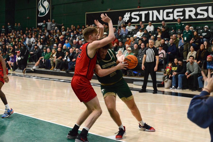 Senior center Callum McRae attempts to drive against an Eastern Washington defender at The Nest in an 82-63 on Thursday, Feb. 2, 2023. McRae finished with 16 points and eight rebounds in the Hornet loss.
