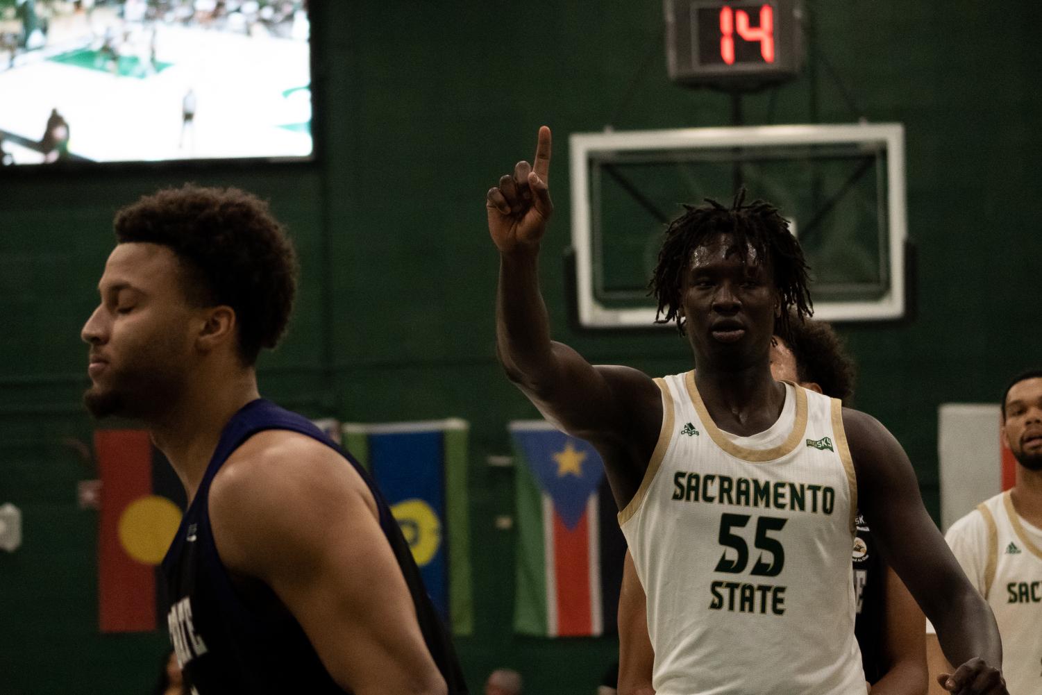 Junior forward Akol Mawein holds a finger towards the baseline at The Nest on Thursday, Feb. 16, 2023 in a 52-49 Hornet loss. Mawein had 11 points in 20 minutes Thursday’s loss to Weber State.