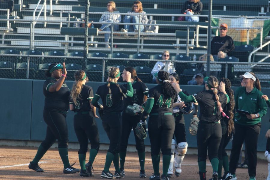 The Sac State softball team huddles around home plate on Thursday, Feb. 9, 2023 at Sac State. The Hornets opened their season with the NorCal kickoff tournament where they won 2 of 5 games. 