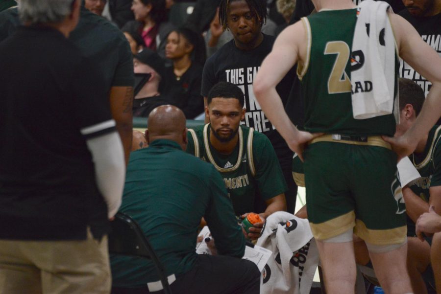 Senior guard Zach Chappell listens to Sac State men’s basketball coach David Patrick during timeout in an 82-63 loss to Eastern Washington at The Nest Thursday,  Feb. 2, 2023. The Hornets moved to 5-5 in the Big Sky Conference while Eastern Washington remains undefeated. 
