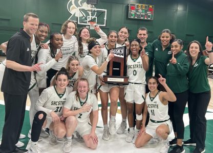 The Sacramento State women’s basketball team celebrates with their trophy after earning part of the Big Sky Conference championship on Monday, Feb. 27, 2023 at The Nest after beating Portland State 80-54. In Sac State head coach Mark Campbell’s second year with the Hornets, he and the team delivered the most successful season in program history.