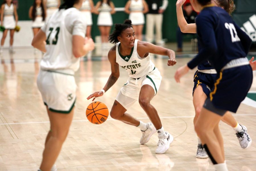 Senior+guard+Kahlaijah+Dean+protects+her+dribble+with+an+arm+bar+against+Northern+Arizona+University+defenders+on+Thursday+Feb.+9th%2C+2023+at+The+Nest+in+a+84-82+overtime+loss+for+Sac+State.+Dean+is+averaging+21.0+points-per-game+in+her+first+year+as+a+Hornet.