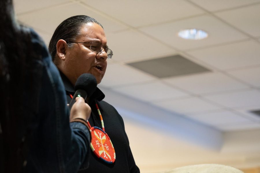 Sacramento State alumnus Myron Horse singing and playing a drum at the APIDA open house in Lassen Hall on Tuesday Feb. 28, 2023. Horse is a member of the Oglala Sioux Tribe from Pine Ridge South Dakota. 