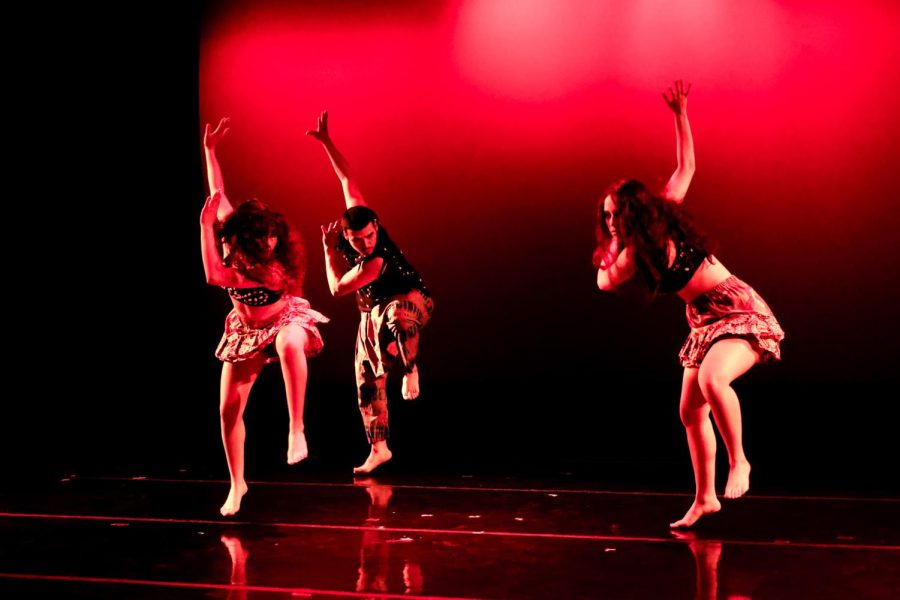 (L–R) Jacqueline Sandoval, Josue Sanchez and Andrea Obando stomp their feet in unison on the dance floor of Solano Hall during their performance Saturday, Feb. 25, 2023. Their set, “Suhu (Life’s Ritual)” showcases a Chinese ritual dance with choreography by Philip Agayapong.
