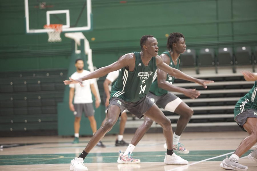 Freshman forward Kiir Kirr Chol Deng in a defensive stance during a help-side drill at practice Friday, Sept. 23, 2022, in The Nest. Deng is entering his second season at Sac State under coach David Patrick.