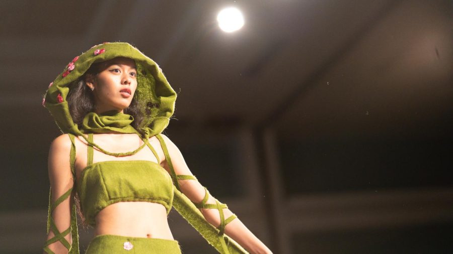 Business marketing major Stacy Sei modeled an earth-inspired outfit at the Forces of Nature fashion show Sunday, April 23, 2023. An overarching theme of the show was sustainability in clothing.