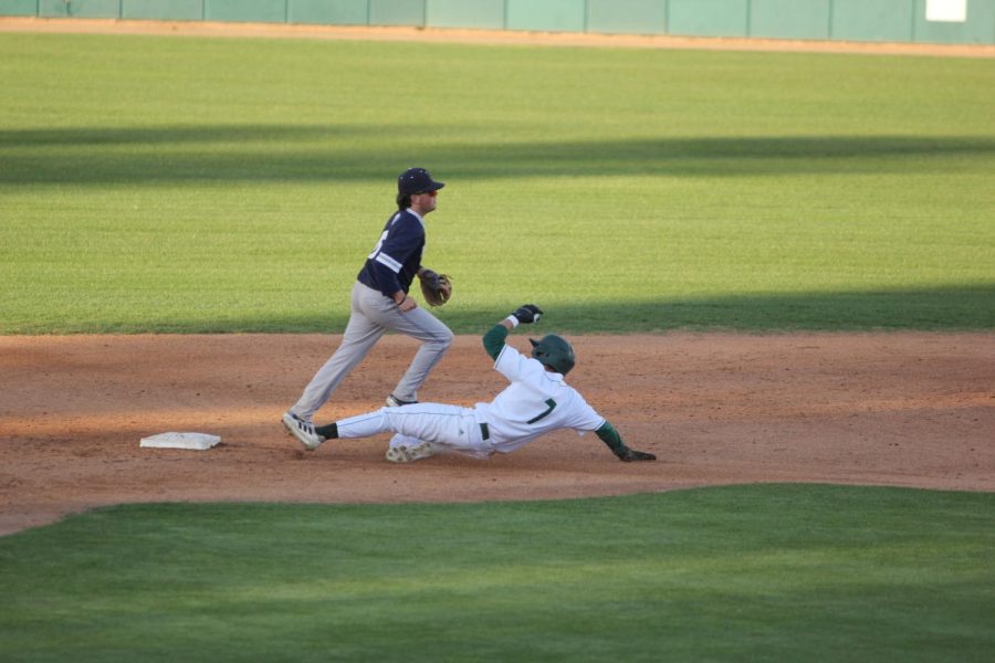 Freshman outfielder Zack Malone steals a base at John Smith Field Monday, April 3, 2023. Malone made his fifth start of the year versus Menlo College, bringing in a run and walking twice en route to a 10-5 victory for the Hornets.