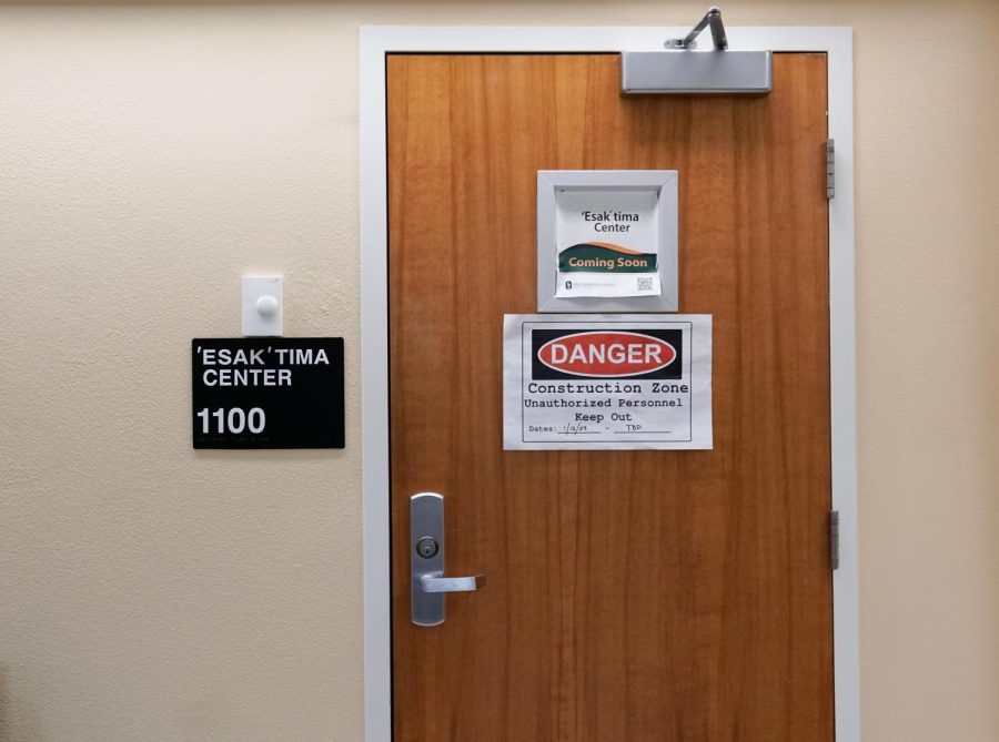“Construction Zone” sign posted on the ‘Esak’tima Center door in Lassen Hall Thursday, April 23, 2023 . To respect the land Sac State occupies, the name ‘Esak’tima means ‘A Place Where Knowledge Comes’ in the Nisenan language. (Photo by Jasmine Ascencio).