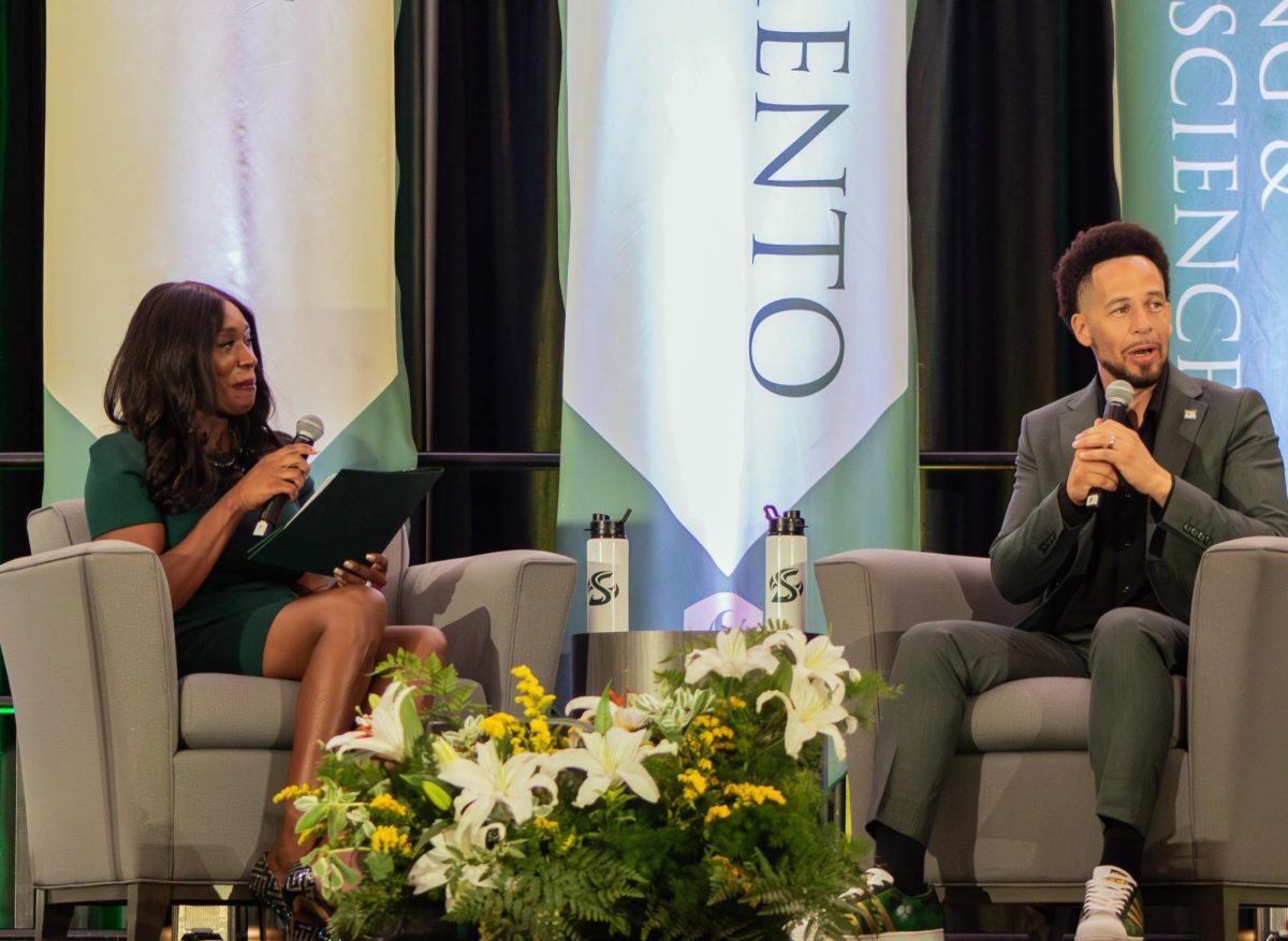 Sacramento State President Luke Wood sits on the University Union Ballroom stage with wife, Idara Essien-Wood Thursday, Aug. 24, during his first fall address. This address is an opportunity for Wood to answer questions and set his expectations going into the new semester. 