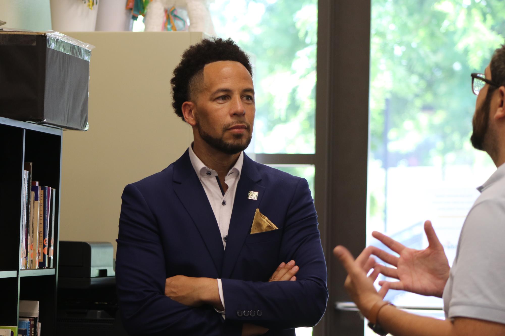 President Luke Wood (left) meeting with members of Sacramento State’s Pride Center including Director of Strategic Student Support Programs Erik Ramirez (right), July 20, 2023. A Sac State alumnus, Wood was named the ninth president and second Black president of the university over the summer.