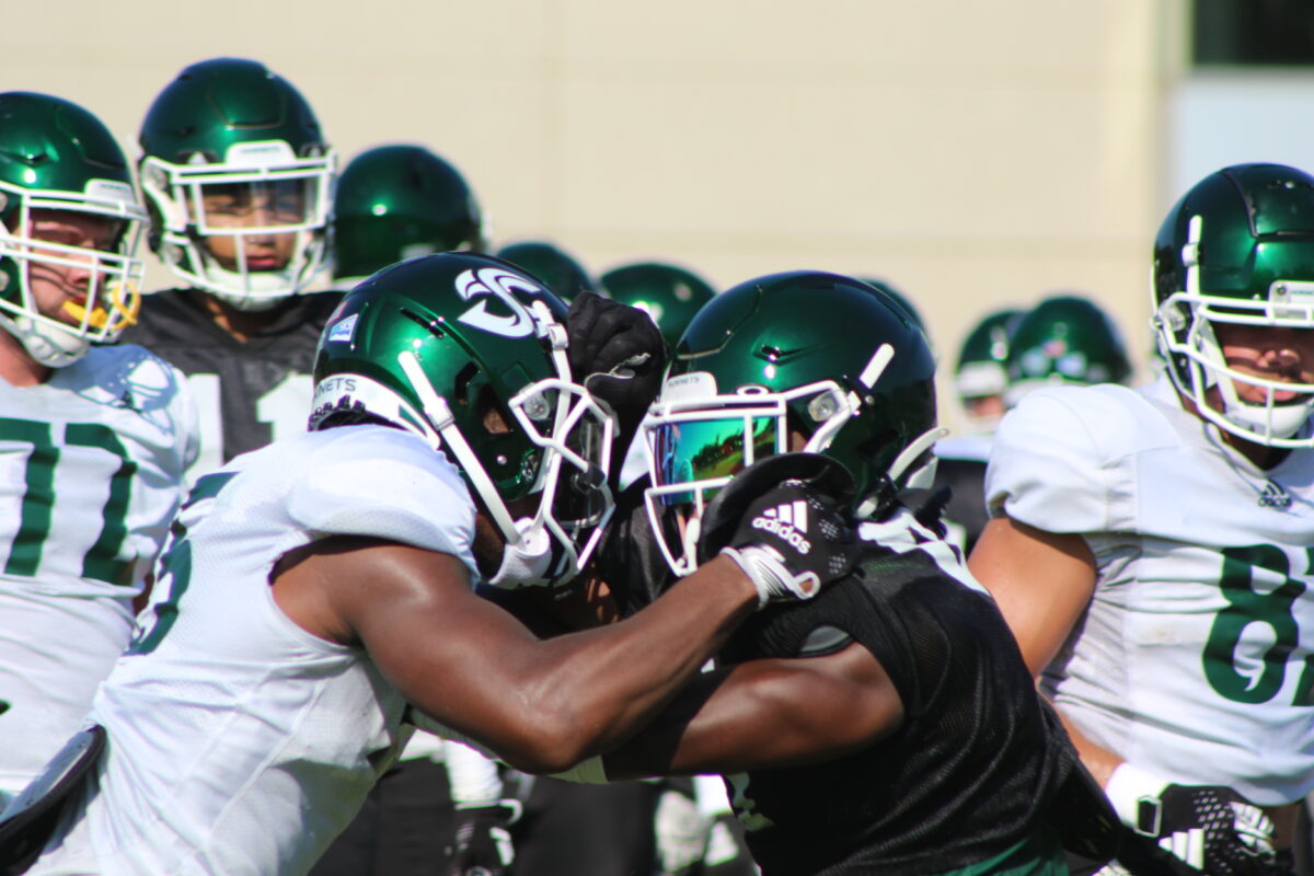 Two Sacramento State football players battle it out in a blocking drill at practice on Tuesday, August 22, 2023. Both the offensive and defensive lines will be critical in the continued success of the Hornets.