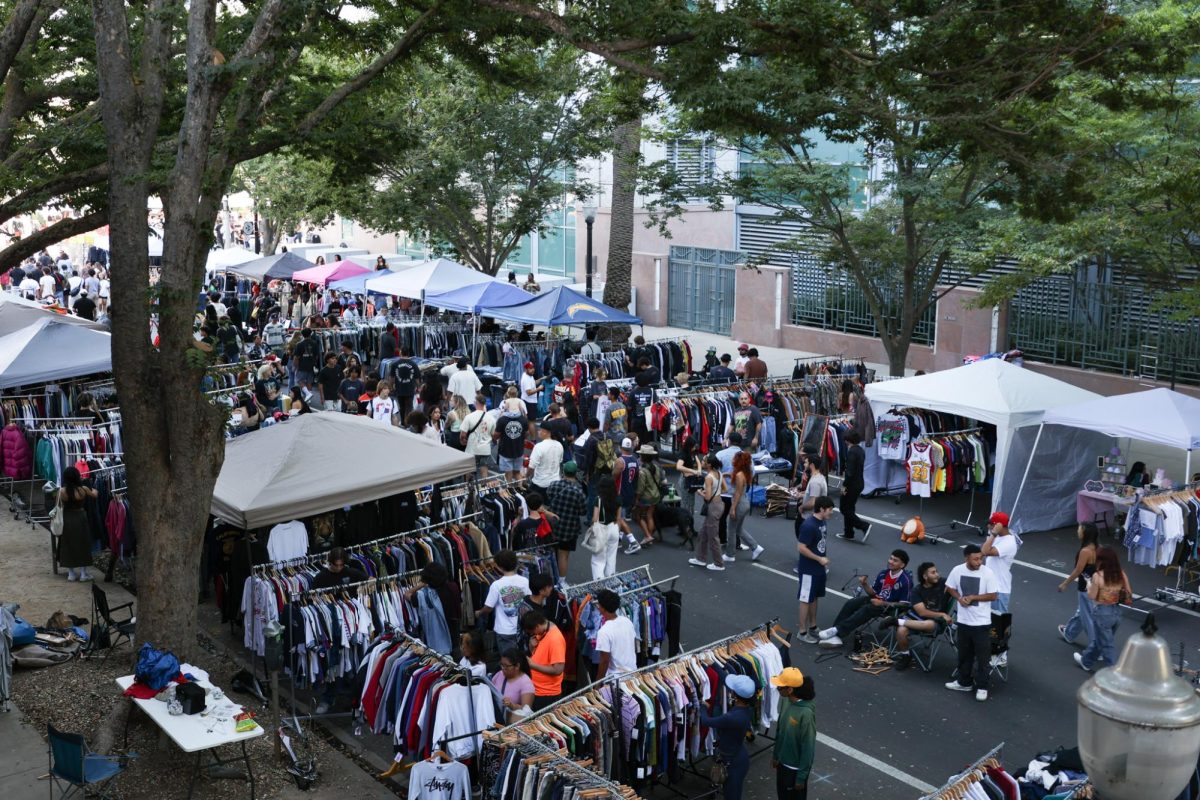 Attendees of World’s Worst Expo browse through vendors on H and 11th st.  Saturday, Sept. 17, 2023. The event started at 10 a.m. and ended at 6 p.m.