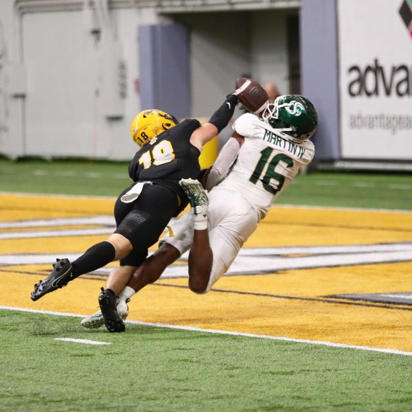 Junior defensive back Tommy McCormick knocks a pass away from senior tight end Marshel Martin IV in the end zone Saturday Sept. 23, 2023. Martin had only two catches for 14 yards against the Vandals.
