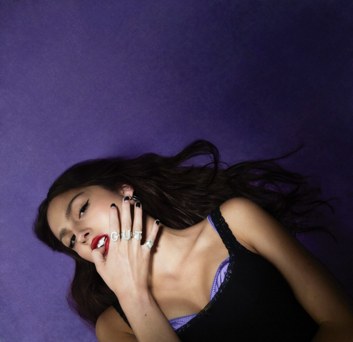 GUTS is the second studio album by Olivia Rodrigo, produced again by Dan Nigro, who produced her first album, SOUR. The pre-release single vampire, was released on June 30, 2023. It debuted atop the Billboard Hot 100. (Photo courtesy of Geffen Records)