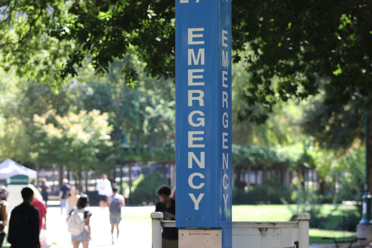 A blue emergency light on the pathway to the Library Quad on campus Thursday, Sept. 12, 2023. The blue lights are used to alert the Sacramento Police Department of incidents occurring on campus.