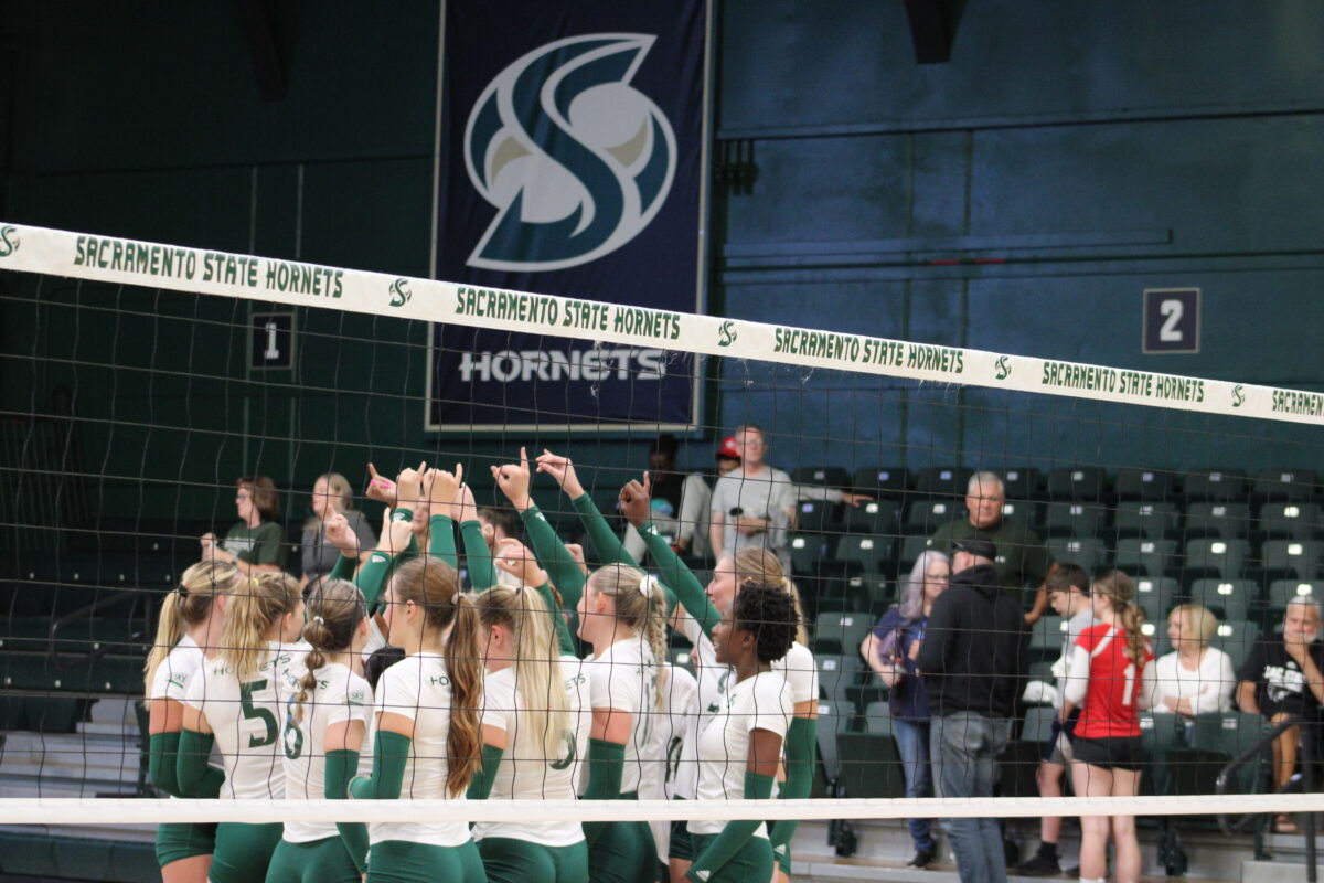 The Sac State volleyball players huddled before the start of the match against Northern Arizona Thursday, Sep. 21, 2023 at The Nest. The Hornets opened their Big Sky play this weekend and are now 2-0 in conference play.