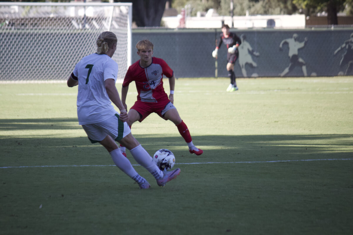 Senior forward Austin Wehner passing the ball against Saint Mary’s Thursday, Sept. 14, 2023. Wehner leads the team in goals scored, with 10 points to his name.