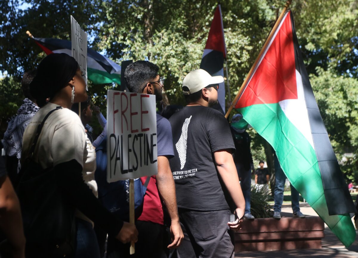 Protestors+gathered+in+the+Library+Quad+as+part+of+a+march+in+support+of+Palestinians%2C+Thursday%2C+Oct.+12%2C+2023.+Those+speaking+at+the+march+expressed+a+need+for+support+for+those+being+affected+by+the+violence+taking+place+in+Gaza.
