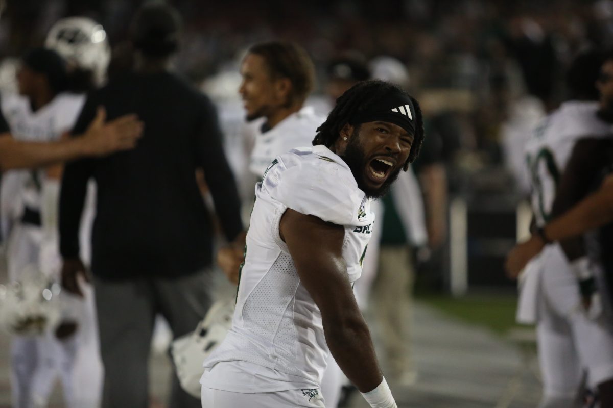 Dillon Juniel let out a celebratory scream postgame Aug. 9, 2023. Sac State beat Troy Taylor and Stanford in Palo Alto.