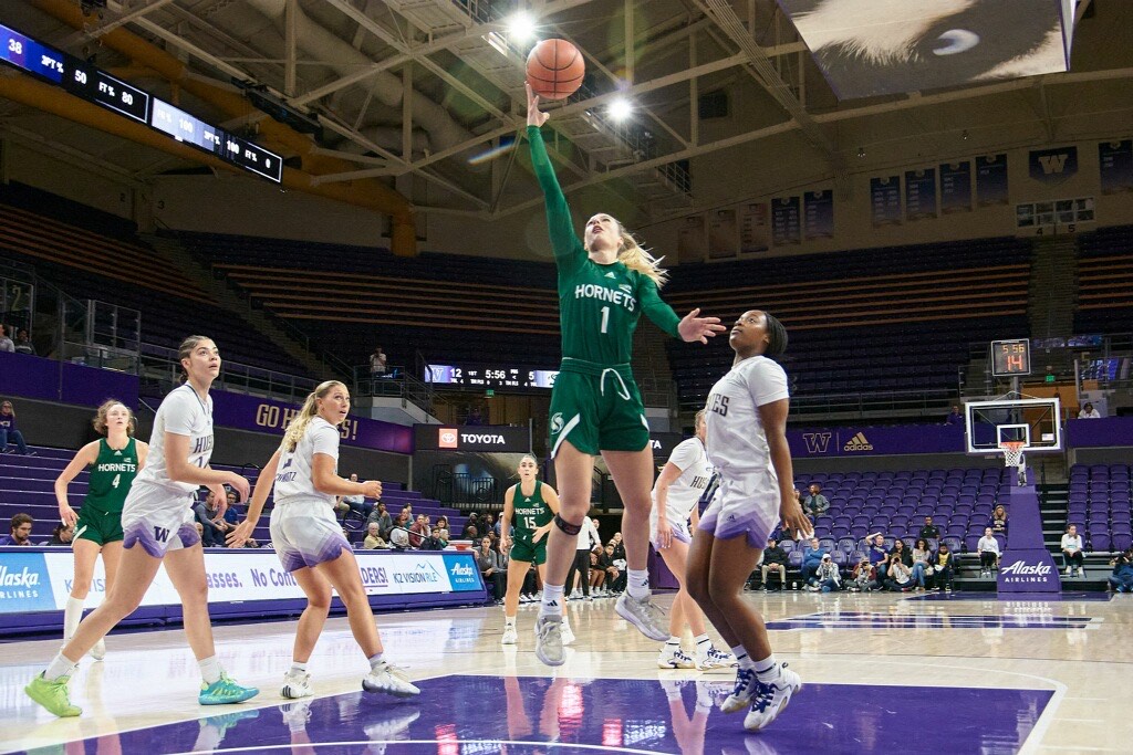 Redshirt sophomore guard Benthe Versteeg attempts a layup against the Huskies in Seattle, Washington Monday Nov. 6, 2023. Versteeg had a total of eight points and two assists in the game.