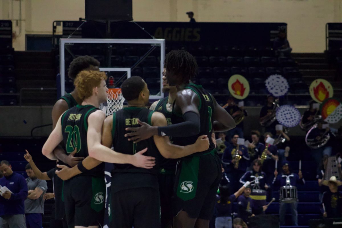 The five on the floor for Sac State huddled late in the fourth Sunday, Nov. 26, 2023 against UC Davis. Sac State improved their overall record against the Aggies to 70-51 with a 69-63 win.