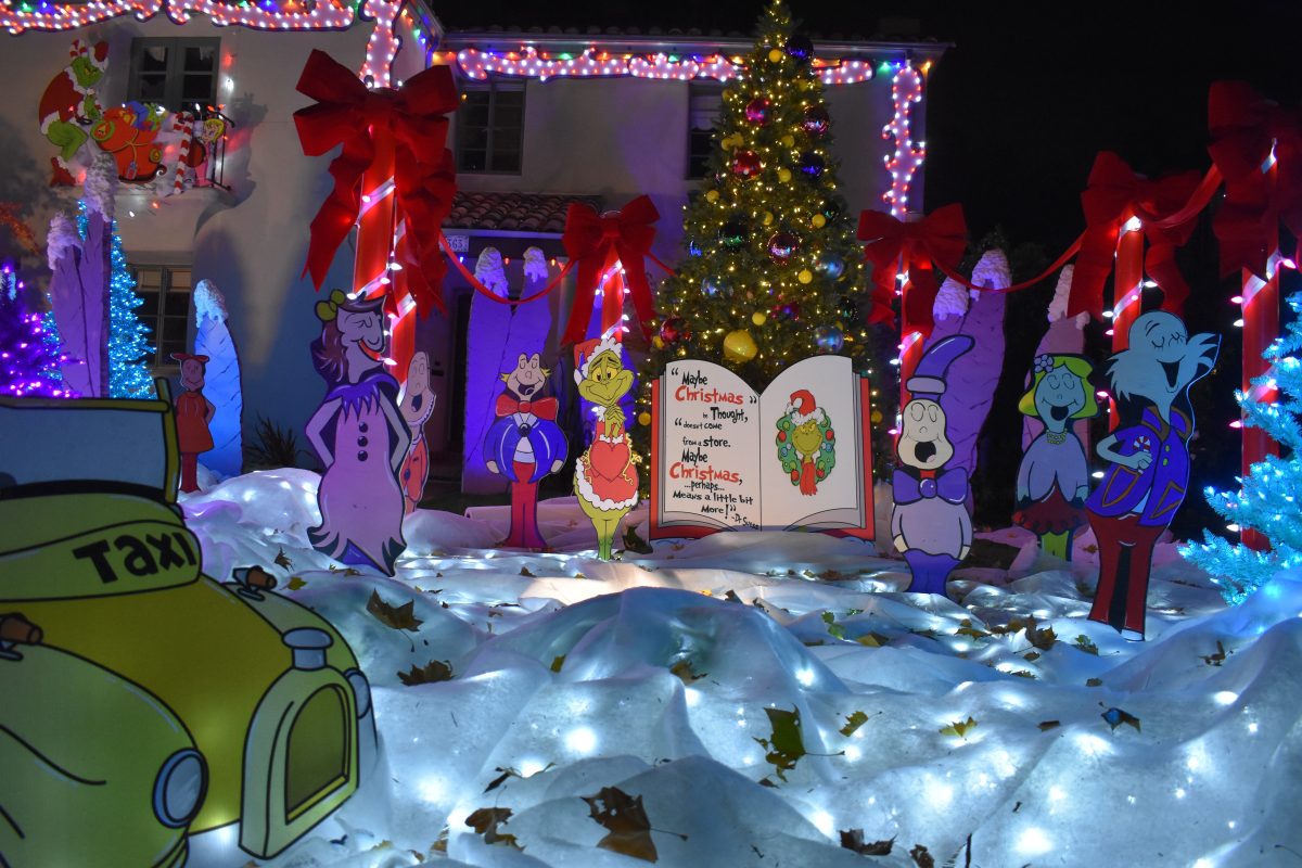 A+Whoville-themed+Christmas+display+from+The+Grinch+Stole+Christmas+on+44th+St.+Friday%2C+Dec.+1%2C+2023.+Every+house+is+free+to+decorate+their+home+as+they+wish+with+cut+outs%2C+inflatables+and+more.
