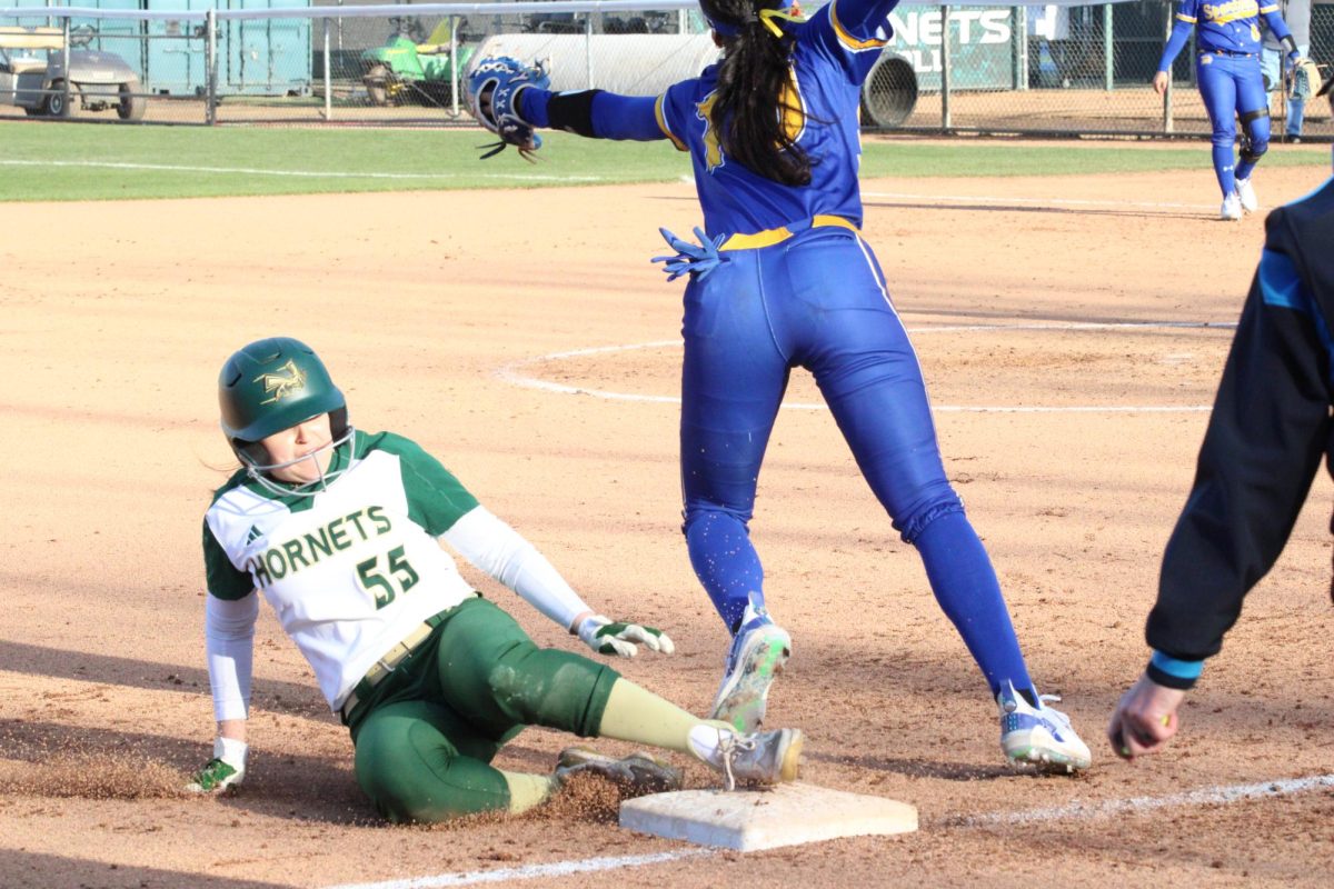 Sophomore outfielder Andrea Lira slides into third base against San Jose State on Friday, Feb. 9, 2024. Lira drove in a run and crossed home plate twice in the win against the Spartans. 
