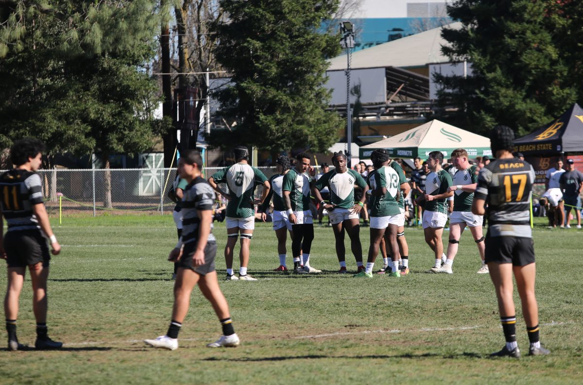 Sac State Mens Rugby Club gather together on the Hornet Field for a game plan late in the second half Saturday, Feb. 10, 2024. The Hornets finished Saturdays game outscoring Long Beach, 15-14 in the second half.