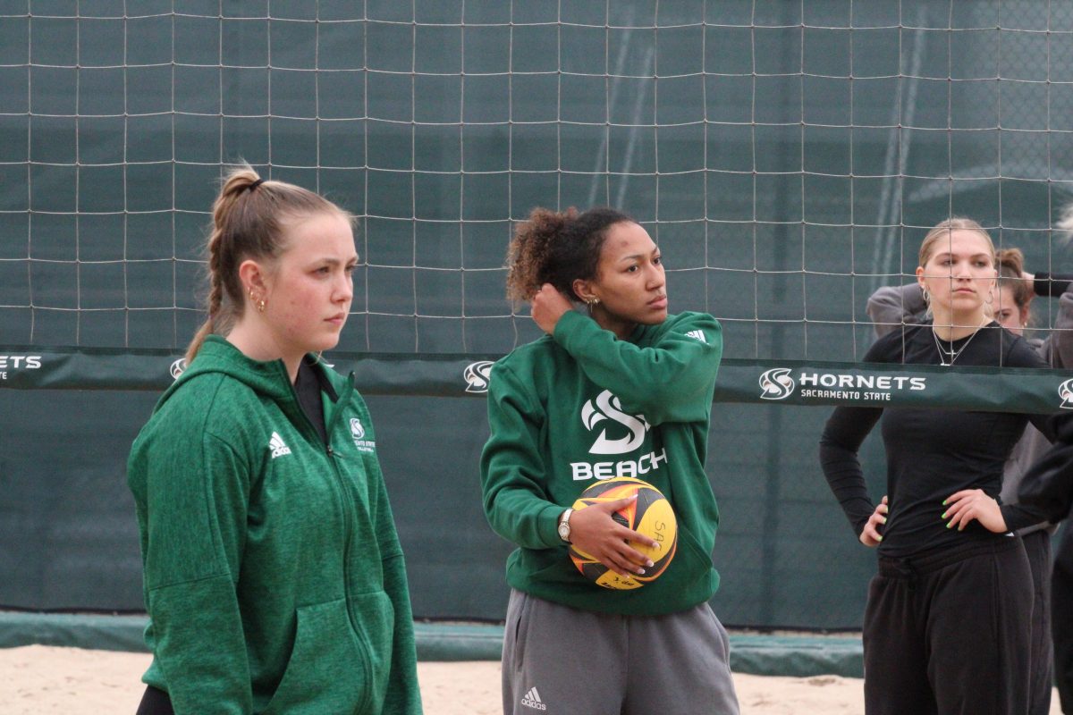 Senior Kalani Hayes practicing her receiving and hitting during beach volleyball practice Tuesday, Feb. 20, 2024. Hayes was an honorable mention all-Big West Conference player last season and will start to build her resume to make it again on Friday.