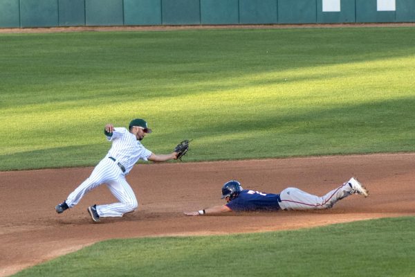 Junior infielder Jose Ruiz dives after a throw in an attempt to make a play Wednesday, Feb. 21, 2024. Ruiz ended the night with two assists. 
