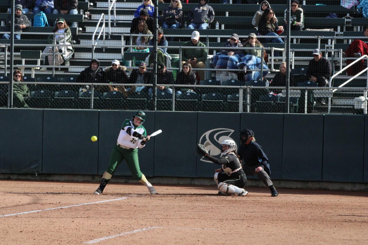 Senior first baseman Caroline Evans up to bat against Cal Poly on Friday, Feb. 9, 2024. In addition to first base, Evans pitched two wins this weekend against San Jose State and UC Davis.